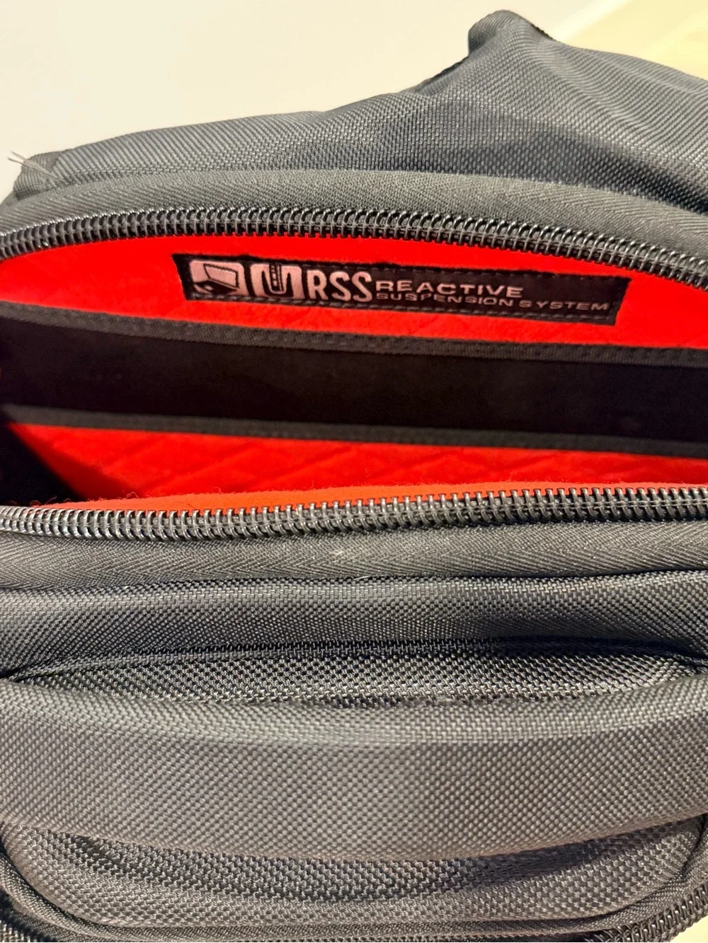 OGIO Black Backpack with Red Zipper Accents